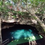 The clear blue waters of the Dzombakal cenote in Yucatán