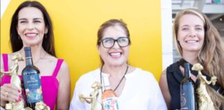 A group of female winemakers in Baja California displaying their awards