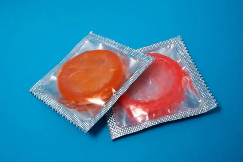 Two brightly coloured condoms