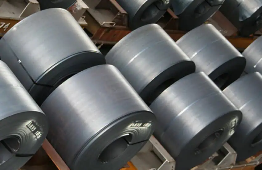 Hot rolled steel in rows in storage in a factory