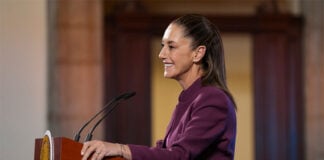 Mexico President Claudia Sheinbaum at the podium at her Friday morning press conference