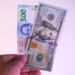 At 1 p.m. Mexico City time, the peso had strengthened from its earlier position of 21 and was trading at 20.75 to the dollar.