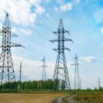 Electricity substation in an open field.