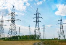 Electricity substation in an open field.