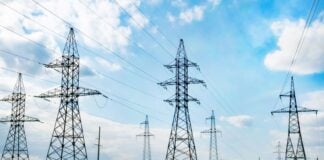 Electricity substation in an open field.