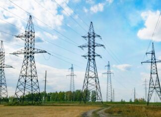 Electricity substation in an open field.