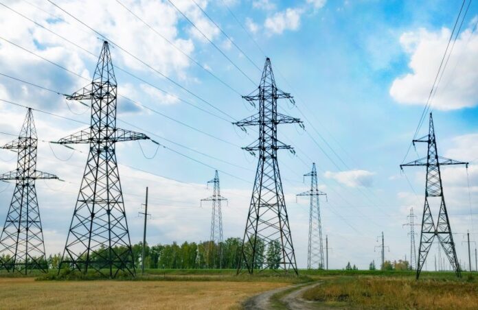 Electricity substation in an open field.