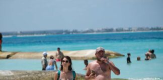 tourist couple on the beach in Mexico
