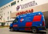 An ambulance pulls up to a hospital
