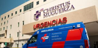 An ambulance pulls up to a hospital