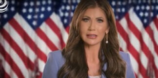 Kristi Noem in an anti-immigration ad from the U.S. government