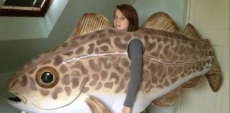 A woman wearing a trout costume to represent funny Mexican sayings