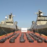 Confiscated cocaine packages in rows on Mexican navy dock