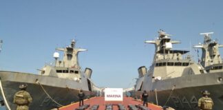 Confiscated cocaine packages in rows on Mexican navy dock