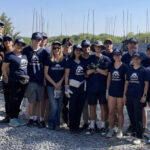 A group of teenagers pose for a photo