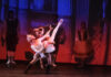 Scene from Jalisco Ballet's Gato con Botas, Puss in Boots dances with a woman