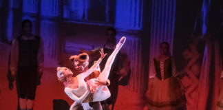 Scene from Jalisco Ballet's Gato con Botas, Puss in Boots dances with a woman