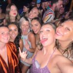 A group of girls at a bar in Tulum