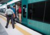 Passengers boarding a Maya Train car