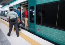Passengers boarding a Maya Train car