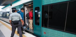Passengers boarding a Maya Train car