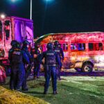 A burnt out bus as part of a narcoblocade
