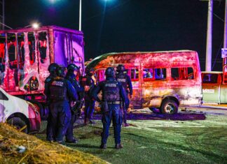 A burnt out bus as part of a narcoblocade