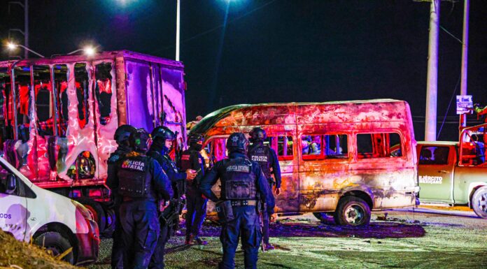 A burnt out bus as part of a narcoblocade