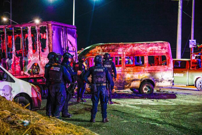 A burnt out bus as part of a narcoblocade