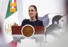 President Sheinbaum at the podium of her morning press conference