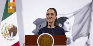 President Sheinbaum smiles at her morning press conference