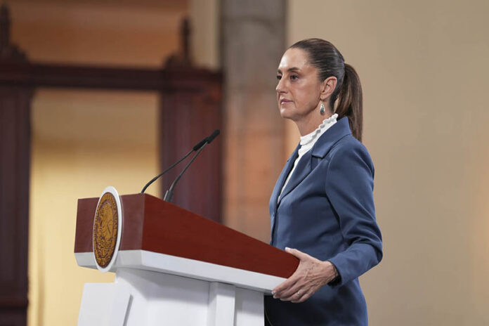 President Sheinbaum at her press conference podium