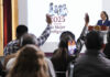 reporters raise their hands at Sheinbaum's morning press conference