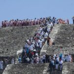 Climbers on the Pyramid of the Moon in Teotihuacan.