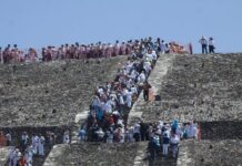 Climbers on the Pyramid of the Moon in Teotihuacan.