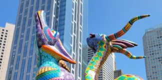 alebrijes set against San Francisco high rises.
