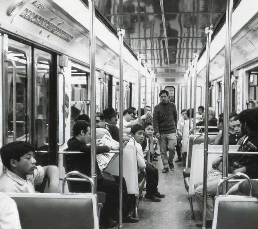 A historical photo showing Mexico City residents riding the metro