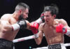 Two boxers fight