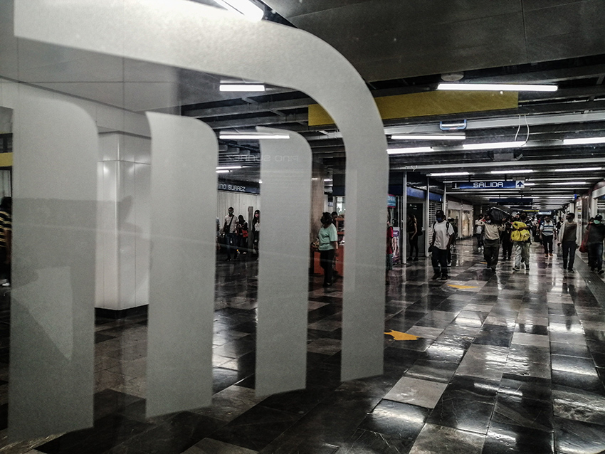 The metro symbol on an entrance into a station