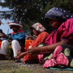 Indigenous people seated