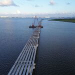 Aerial view of unfinished Nichupté bridge.