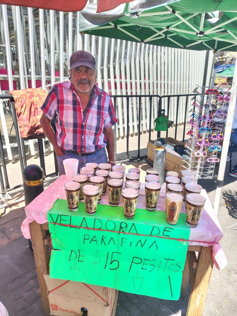 A candle seller outside the Mexico City Metro Station