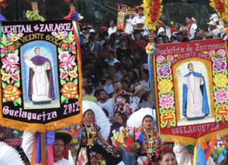 A street parade with colored banners