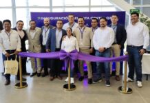 Membes of the ODATA team and local officials celebrate the opening of a new data center in Queretéro.