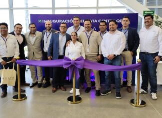Membes of the ODATA team and local officials celebrate the opening of a new data center in Queretéro.