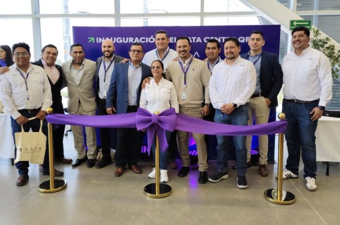 Membes of the ODATA team and local officials celebrate the opening of a new data center in Queretéro.