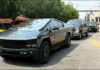 A parade of Jalisco security vehicles including a Tesla Cybertruck