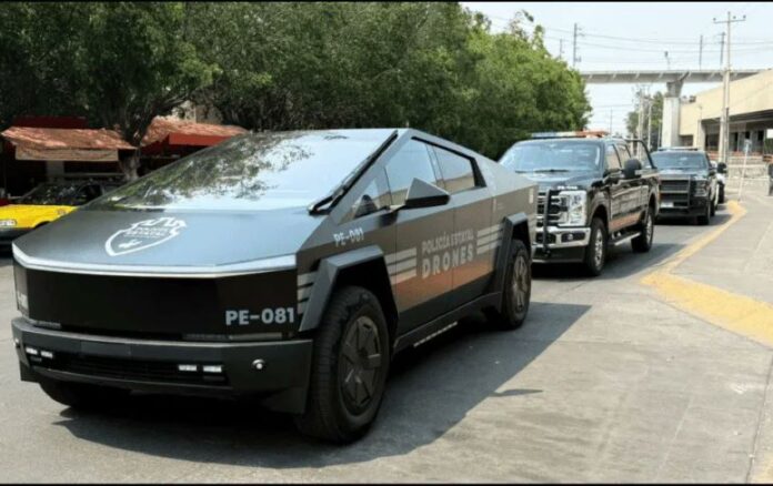 A parade of Jalisco security vehicles including a Tesla Cybertruck
