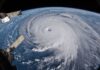 A hurricane with its eye on Earth, seen from outer space.