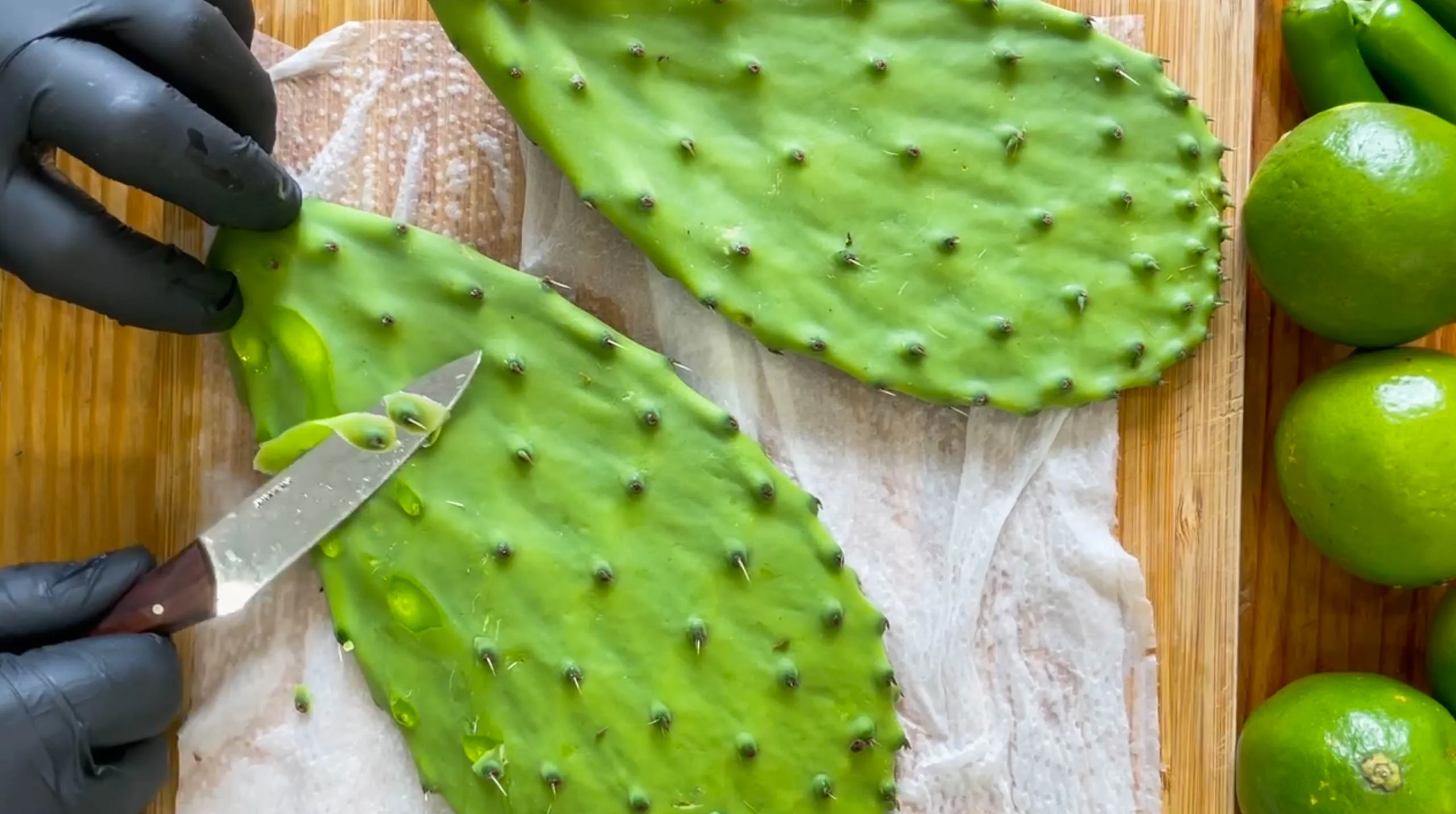 nopales being prepared with a small knife